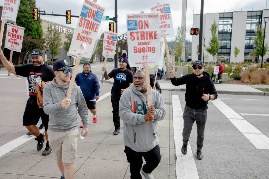 Striking Boeing workers and their supporters picket outside the Boeing Co. manufacturing facility in Renton, Washington on September 16, 2024