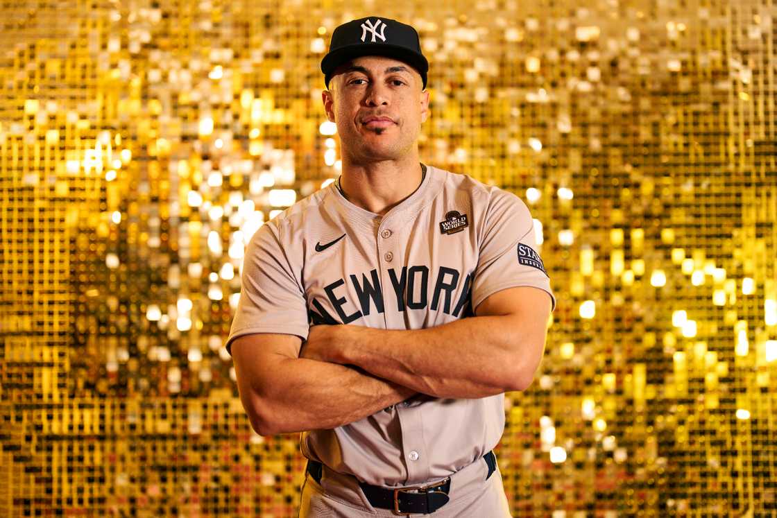 Giancarlo Stanton poses for a photo during the workout day before the 2024 World Series