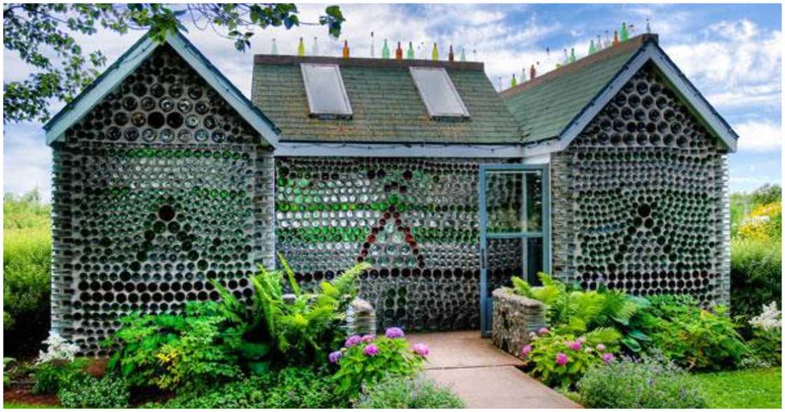 A house made out of glass bottles A house made out of glass bottles