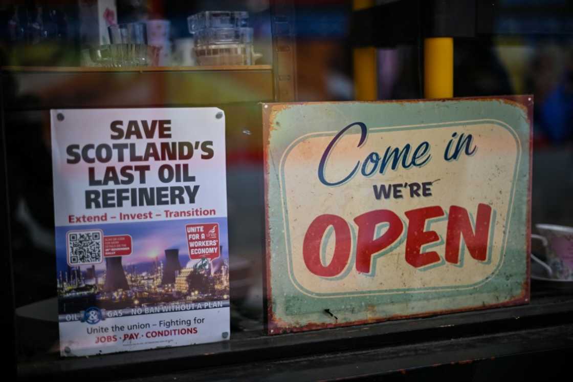 The run-down town centre of Grangemouth is dotted with half-shuttered shop fronts The run-down town centre of Grangemouth is dotted with half-shuttered shop fronts