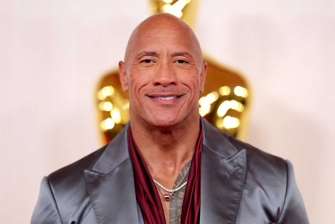 The Rock in a grey suit