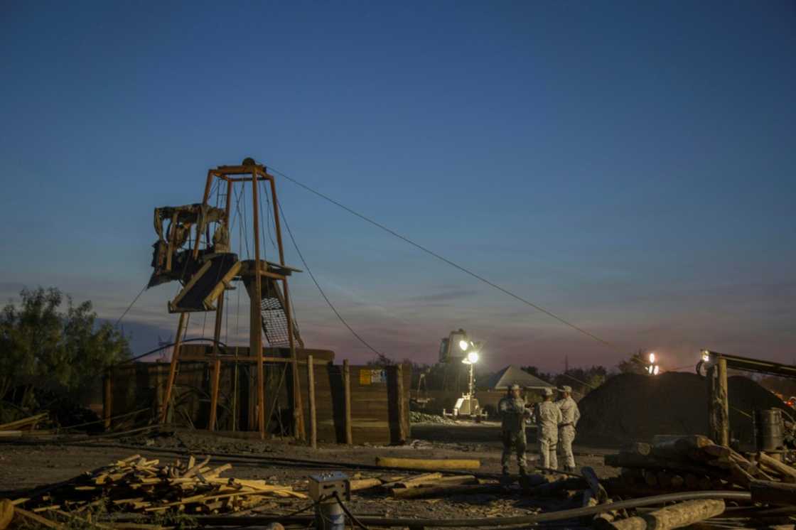 Rescuers work at a coal mine in northern Mexico where 10 people are trapped