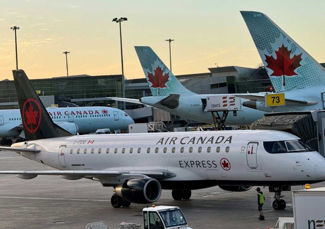 Air Canada says it has reached a last-minute deal with its pilots to avert a strike that would have grounded flights Air Canada says it has reached a last-minute deal with its pilots to avert a strike that would have grounded flights