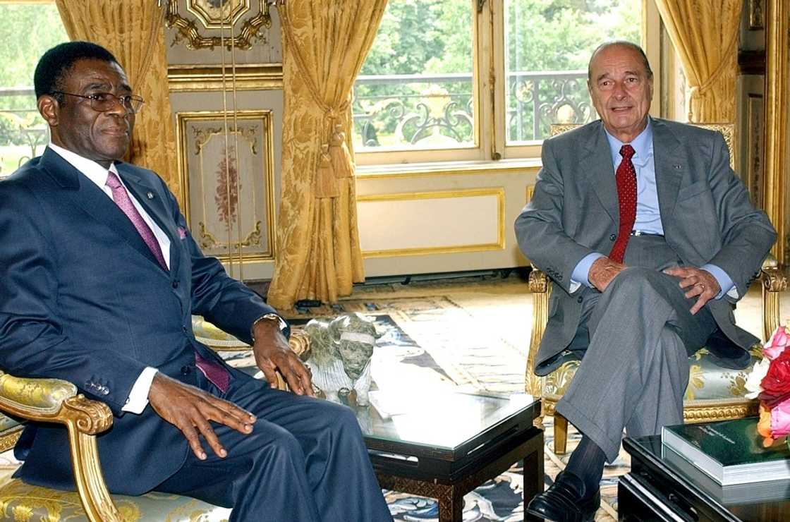 President Teodoro Obiang Nguema Mbasogo meets Jacques Chirac at the Elysee palace in Paris July 21, 2004 President Teodoro Obiang Nguema Mbasogo meets Jacques Chirac at the Elysee palace in Paris July 21, 2004