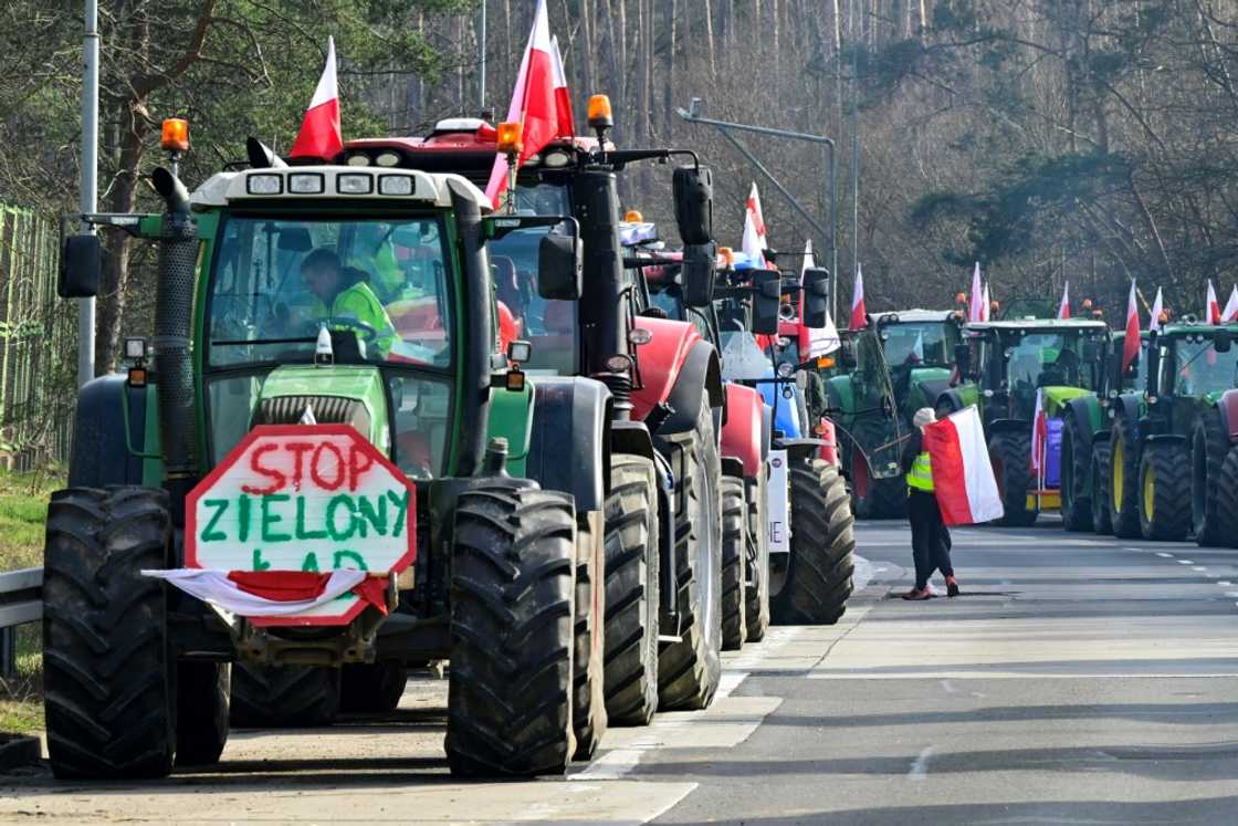 The farmers began their blockade on Sunday, parking their tractors on the A2 motorway near Slubice in western Poland, close to the border with Germany The farmers began their blockade on Sunday, parking their tractors on the A2 motorway near Slubice in western Poland, close to the border with Germany