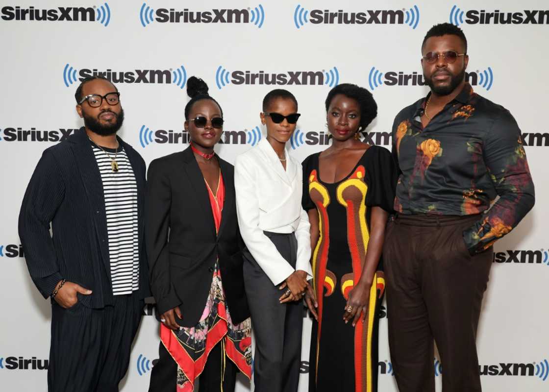 Director Ryan Coogler (L), poses with 'Black Panther: Wakanda Forever' cast members (L-R) Lupita Nyong'o, Letitia Wright, Danai Gurira and Winston Duke at a SiriusXM event in New York on November 7, 2022