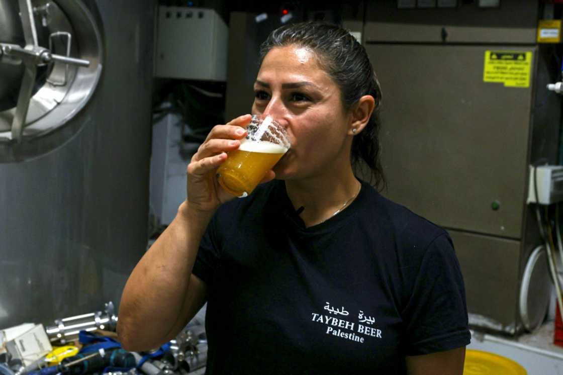 Madees Khoury, 38, took over the family business from her father - she said economic hardship brought on by the Gaza war was hitting sales Madees Khoury, 38, took over the family business from her father - she said economic hardship brought on by the Gaza war was hitting sales