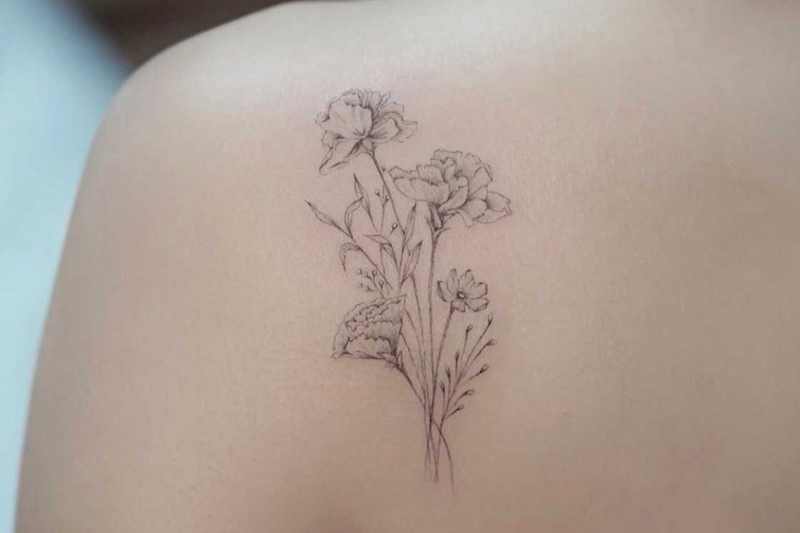 A bundle of wildflower shoulder front tattoo A bundle of wildflower shoulder front tattoo