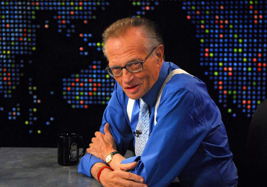 Actor Larry King poses for a picture in the studio. Actor Larry King poses for a picture in the studio.