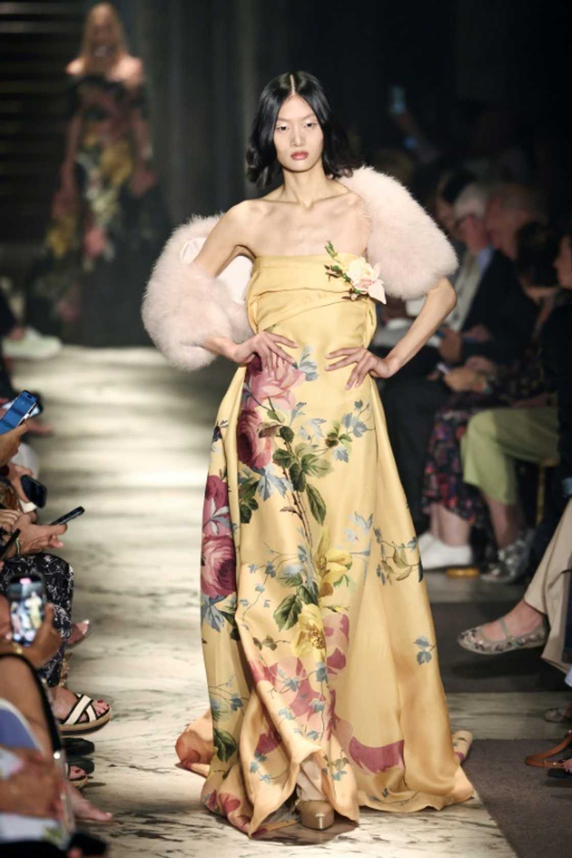 Chinese model Yilan Hua presents a rose-embellished creation for Elie Saab Chinese model Yilan Hua presents a rose-embellished creation for Elie Saab