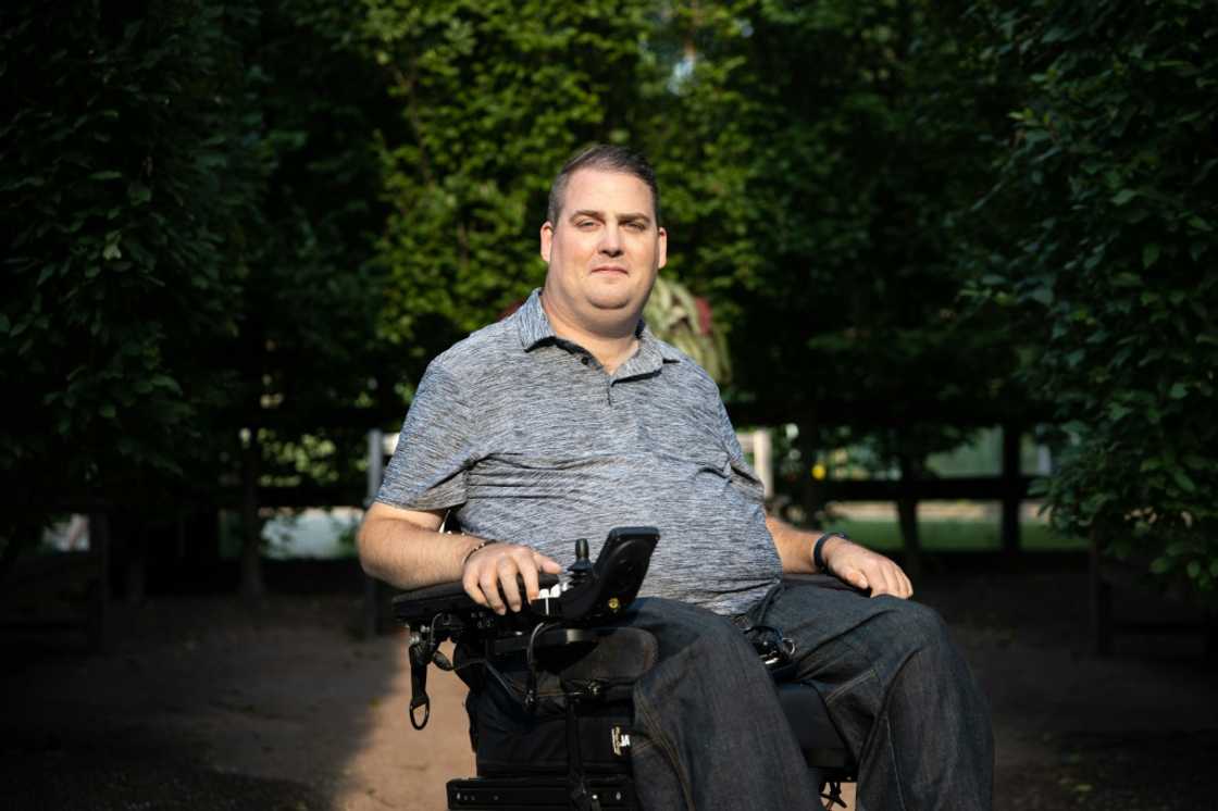 A brain implant allowed Ian Burkhart to close his hand for the first time since being paralysed in a diving accident A brain implant allowed Ian Burkhart to close his hand for the first time since being paralysed in a diving accident