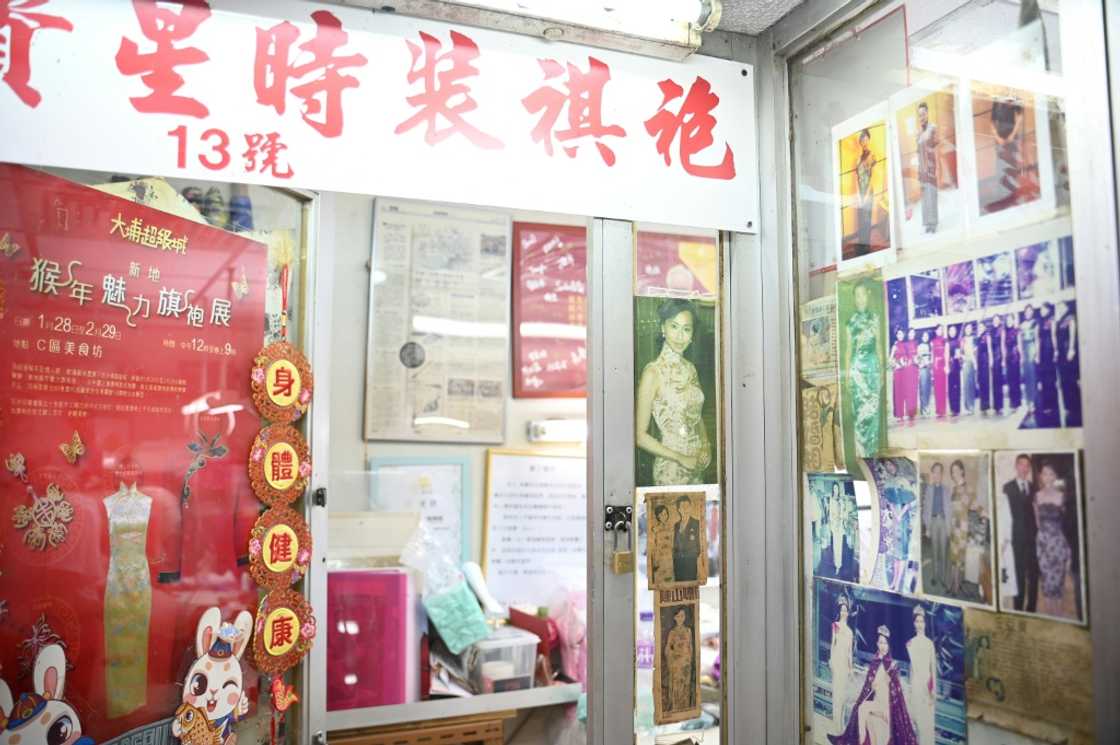 Yan Kar-man's workshop walls are plastered with photos of beauty pageant queens wearing his dresses Yan Kar-man's workshop walls are plastered with photos of beauty pageant queens wearing his dresses