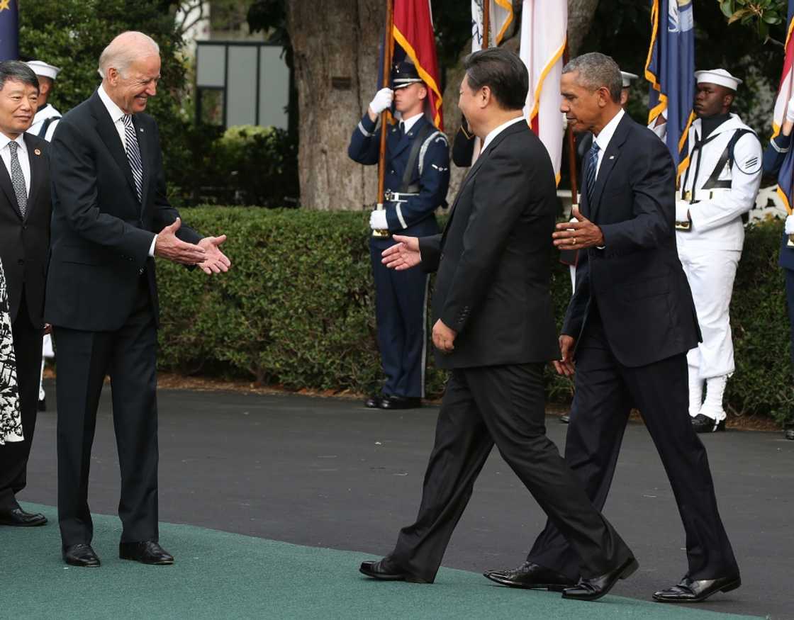 Joseph Biden, then vice president, meeting Chinese leader Xi Jinping (C) at the White House in September 2015 as then US president Barack Obama stands by Joseph Biden, then vice president, meeting Chinese leader Xi Jinping (C) at the White House in September 2015 as then US president Barack Obama stands by