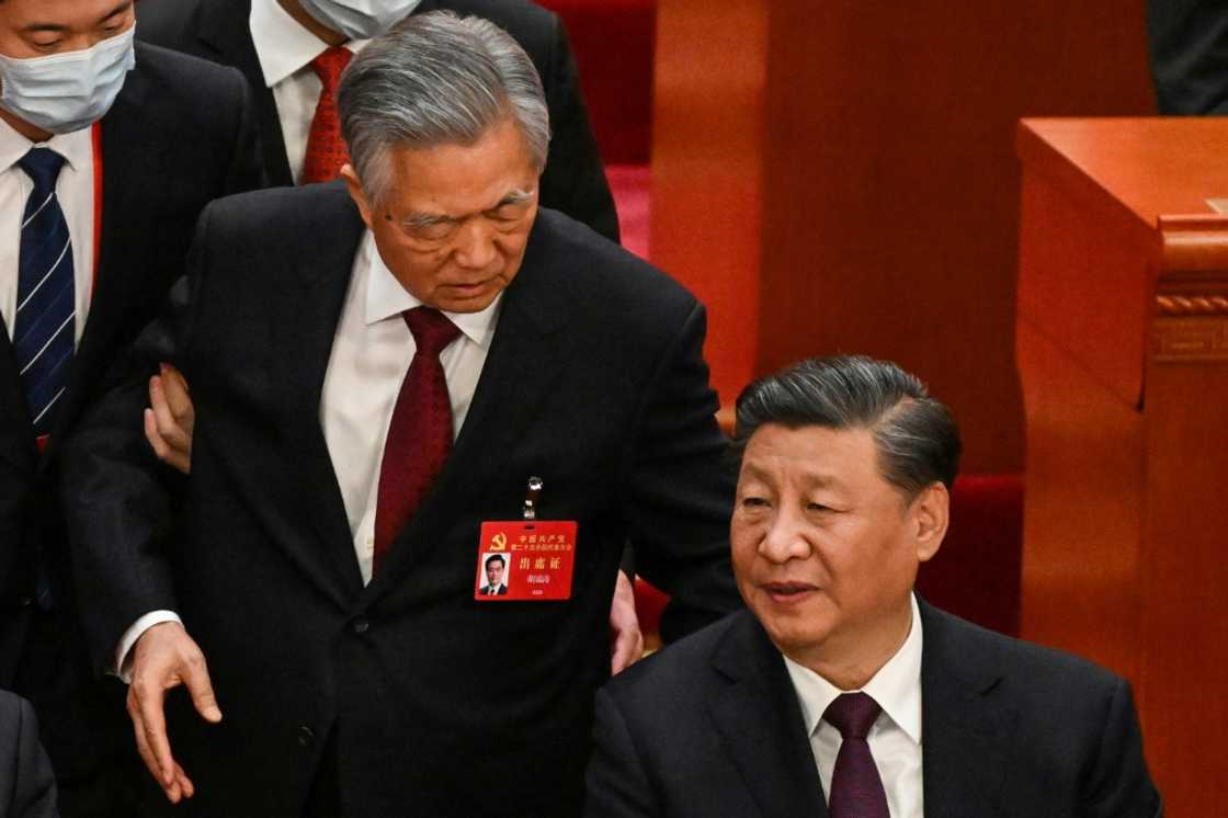 The sudden exit of former Chinese leader Hu Jintao provided a rare moment of drama at an otherwise meticulously choreographed event The sudden exit of former Chinese leader Hu Jintao provided a rare moment of drama at an otherwise meticulously choreographed event