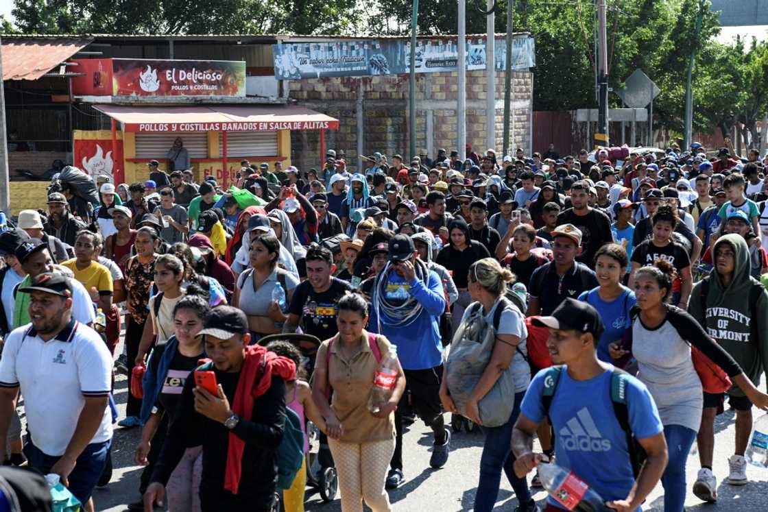 US-bound migrants set off on foot in a caravan in southern Mexico US-bound migrants set off on foot in a caravan in southern Mexico