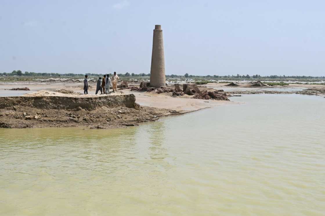 Though the floods that engulfed Aqilpur and its surrounding fields have receded from the highs of a week ago, the kilns are still surrounded by water Though the floods that engulfed Aqilpur and its surrounding fields have receded from the highs of a week ago, the kilns are still surrounded by water