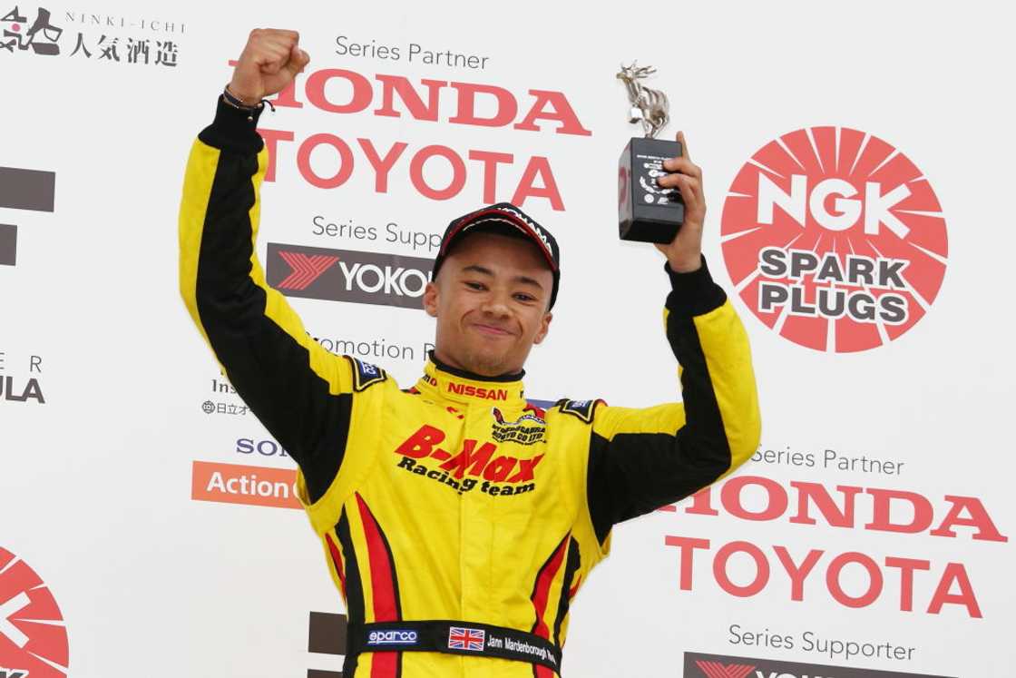 Jann Mardenborough receiving an award Jann Mardenborough receiving an award