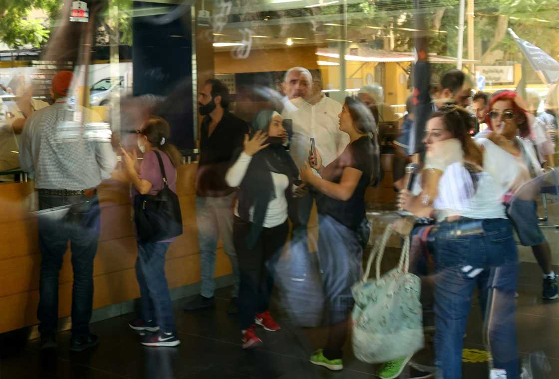 A woman held up a bank in Beirut on September 14, 2022, demanding access to her sister's deposits, one of a spate of such incidents in recent weeks