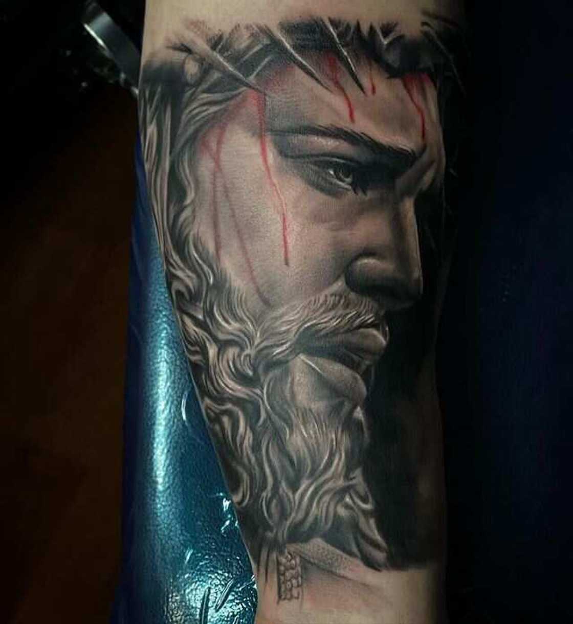 Religious sleeve tattoos for men