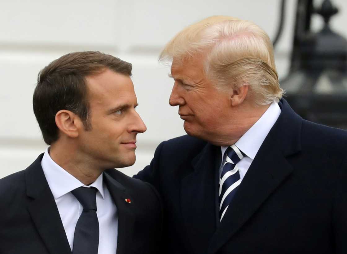 Macron tried to woo Biden's predecessor Donald Trump (R) early in his term Macron tried to woo Biden's predecessor Donald Trump (R) early in his term