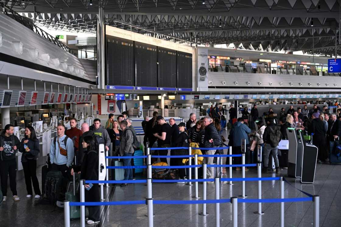 Passengers queue for rebooking at Frankfurt Airport this month after workers went on strike, forcing hundreds of flight cancellations across Germany Passengers queue for rebooking at Frankfurt Airport this month after workers went on strike, forcing hundreds of flight cancellations across Germany