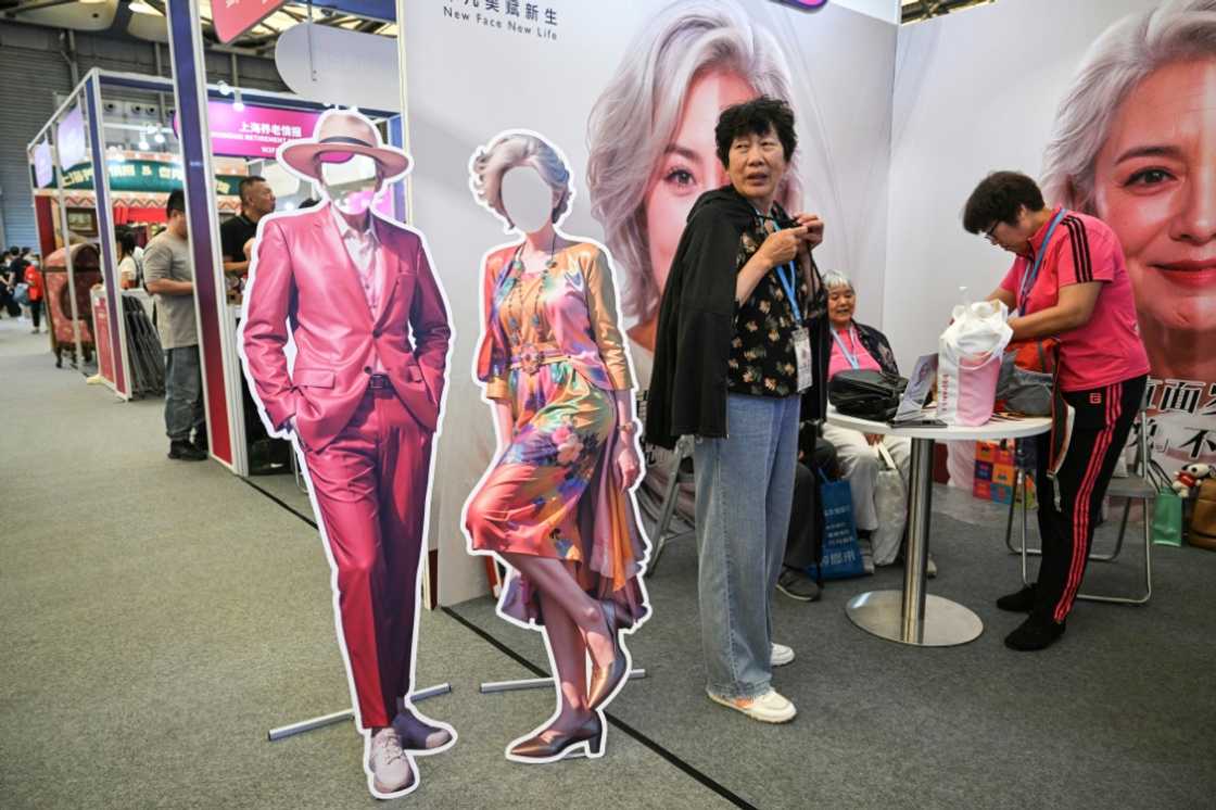 Rather than relying on people -- traditionally one's children -- to provide care, many of the trade fair's exhibitors showcased gadgets Rather than relying on people -- traditionally one's children -- to provide care, many of the trade fair's exhibitors showcased gadgets
