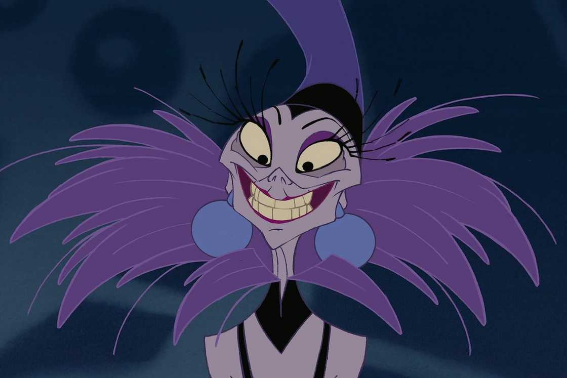 Yzma smiles against a blurred background Yzma smiles against a blurred background