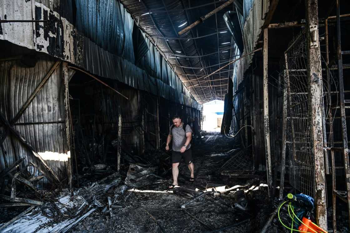 The charred remains of the central market in Sloviansk on Wednesday The charred remains of the central market in Sloviansk on Wednesday