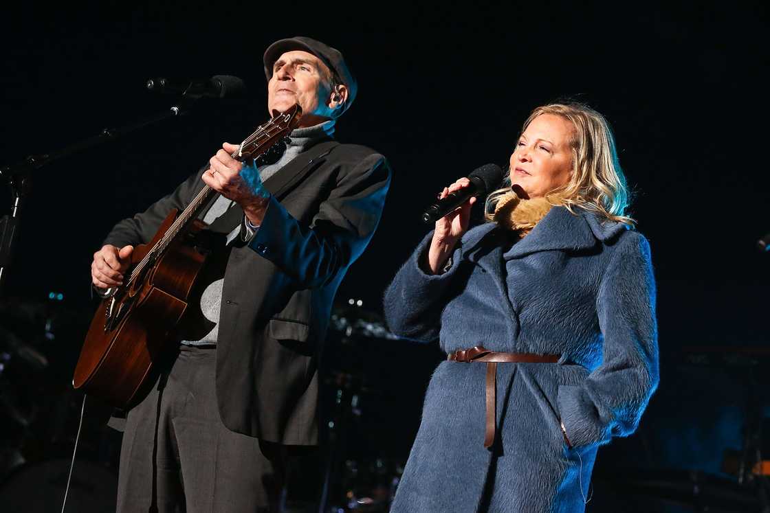 James and Kim Taylor perform during the 94th Annual National Christmas Tree Lighting Ceremony on the Ellipse in President's Park in Washington, DC James and Kim Taylor perform during the 94th Annual National Christmas Tree Lighting Ceremony on the Ellipse in President's Park in Washington, DC