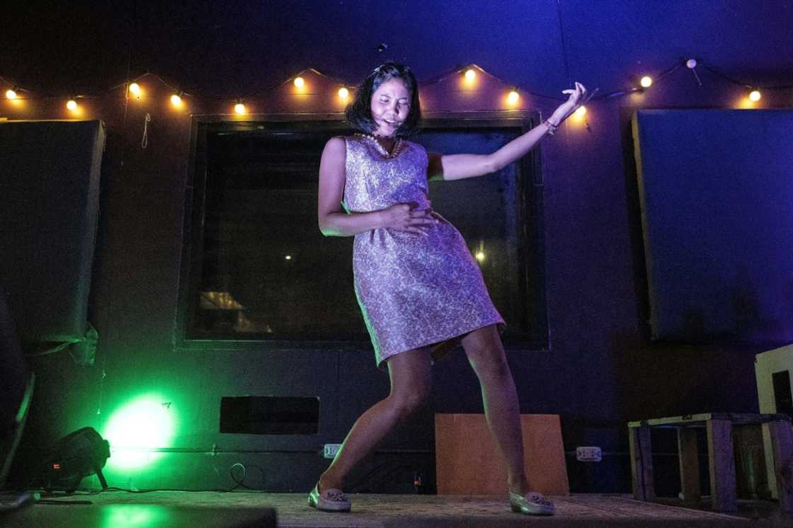 Contestents battle for the chance to represent Thailand at the air guitar World Championships in Finland Contestents battle for the chance to represent Thailand at the air guitar World Championships in Finland