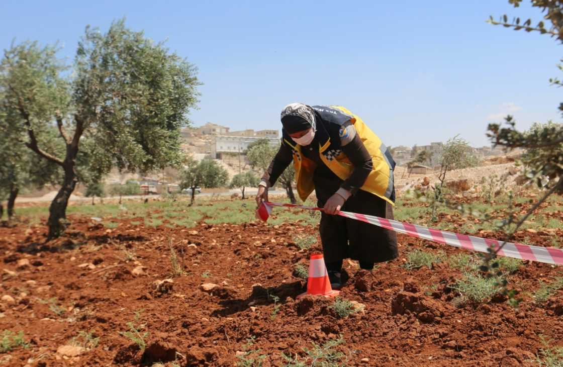 About 10.2 million people, or roughly half of all Syrians, live in areas contaminated with explosive devices, the UN says About 10.2 million people, or roughly half of all Syrians, live in areas contaminated with explosive devices, the UN says