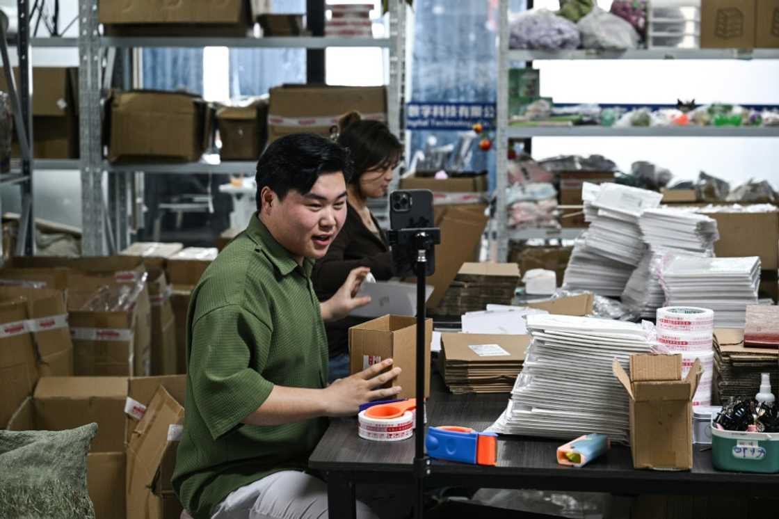 Put off by low pay in his hometown, Ouyang now works as a livestreamer at an e-commerce company in east China's Zhejiang province Put off by low pay in his hometown, Ouyang now works as a livestreamer at an e-commerce company in east China's Zhejiang province