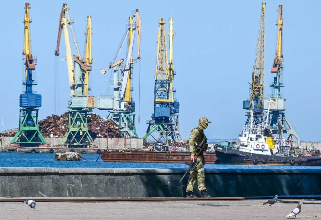 A Russian serviceman patrols on the promenade in Berdyansk in mid-June amid the ongoing Russian military action in Ukraine A Russian serviceman patrols on the promenade in Berdyansk in mid-June amid the ongoing Russian military action in Ukraine