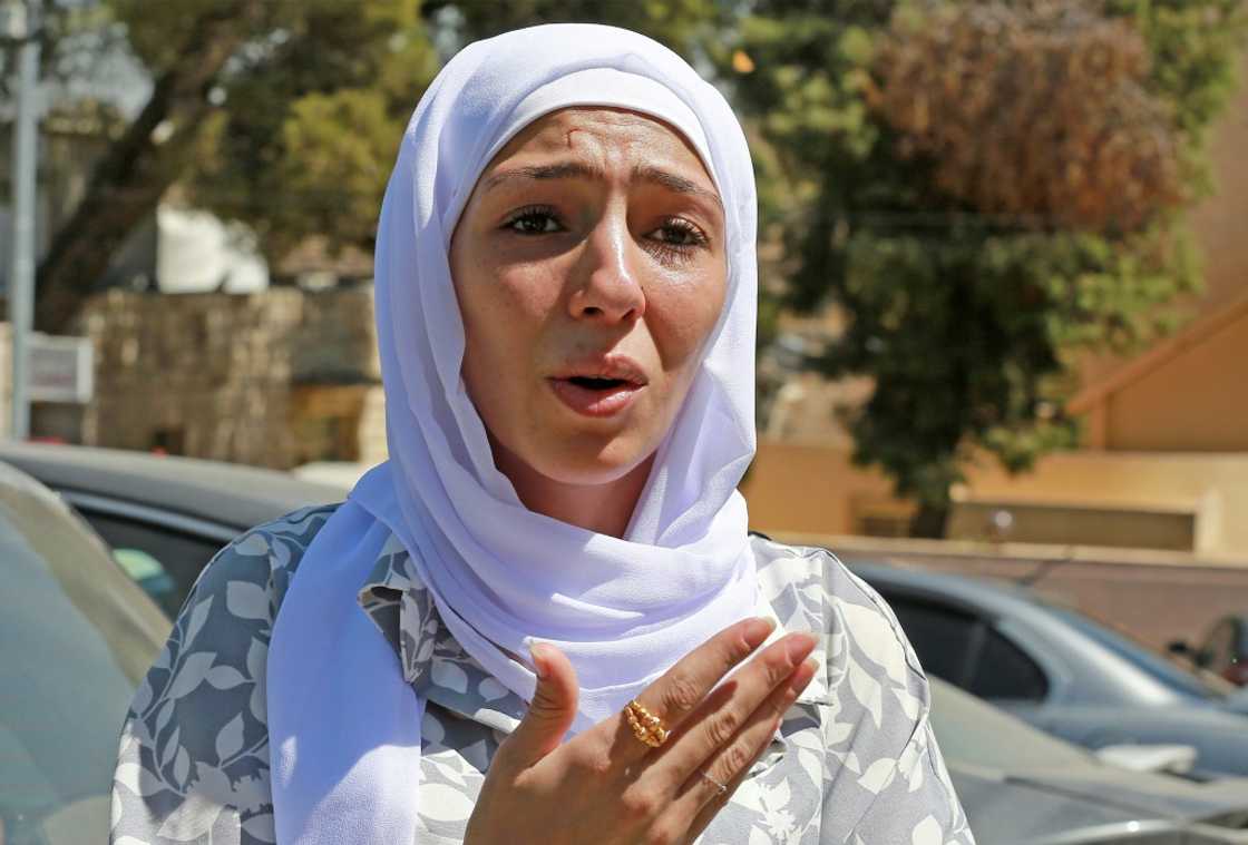 Israa Raed, whose four-month-old baby girl Malak was pulled alive from the rubble of a building more than 24 hours after it collapsed, told AFP "words cannot describe how happy I am" Israa Raed, whose four-month-old baby girl Malak was pulled alive from the rubble of a building more than 24 hours after it collapsed, told AFP "words cannot describe how happy I am"
