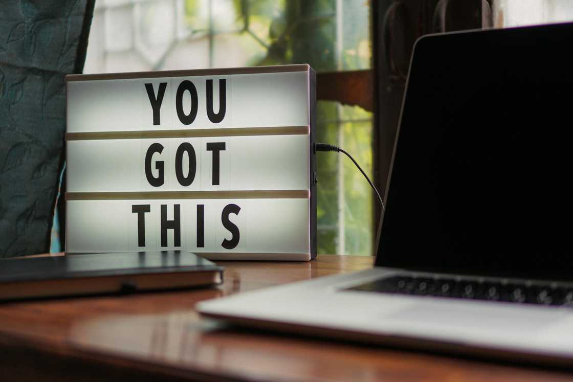"You got this" motivational quote alongside a laptop on the table "You got this" motivational quote alongside a laptop on the table