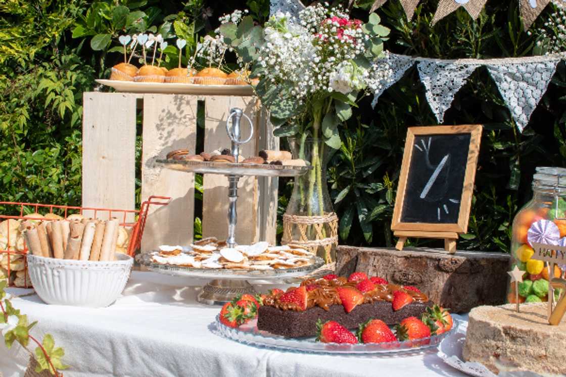 First birthday set up featuring a cake and some fresh berries First birthday set up featuring a cake and some fresh berries