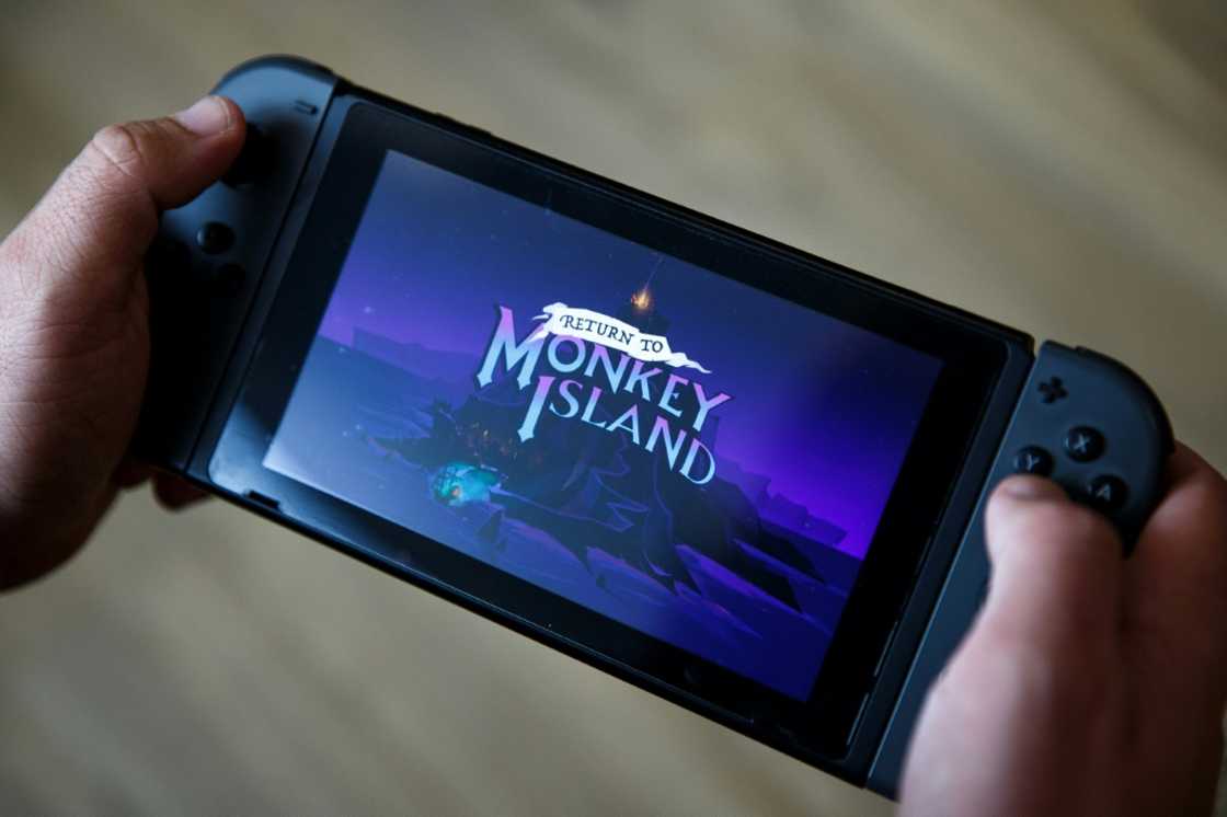 "Return to Monkey Island" (Retour sur l'île aux Singes), nouvel opus du jeu vidéo culte "Monkey Island", le 20 septembre 2022 à Paris, sur une console de jeux portable "Return to Monkey Island" (Retour sur l'île aux Singes), nouvel opus du jeu vidéo culte "Monkey Island", le 20 septembre 2022 à Paris, sur une console de jeux portable