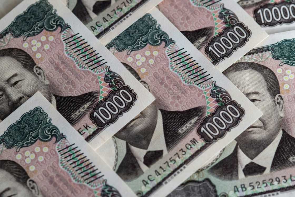 The yen strengthened against the dollar after the head of the Bank of Japan said he would hike interest rates further if the economy performs as expected The yen strengthened against the dollar after the head of the Bank of Japan said he would hike interest rates further if the economy performs as expected