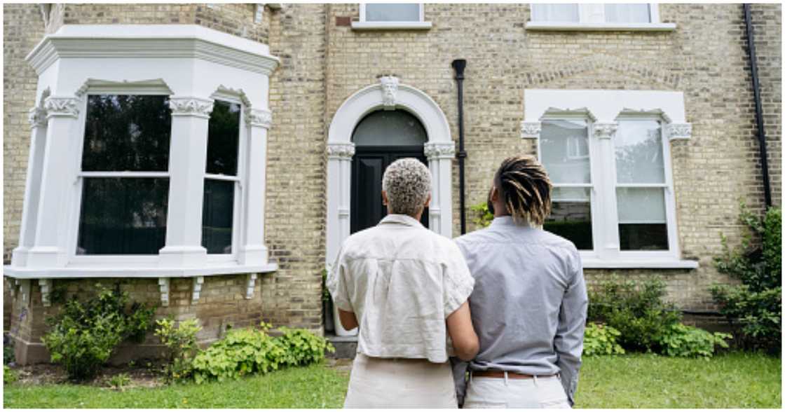 A couple looks at a home they want to buy