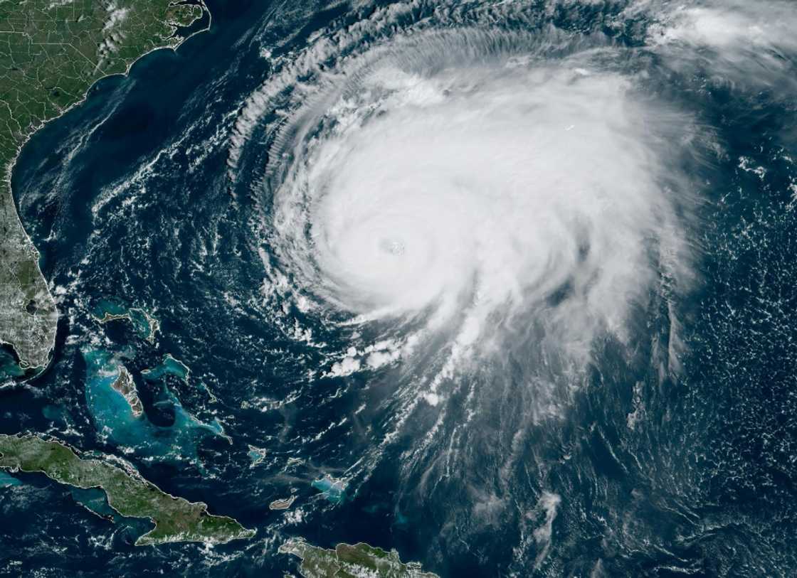 This image obtained from the National Oceanic and Atmospheric Administration shows Hurricane Fiona at 10:50 EDT (14:50 GMT) on September 22, 2022 This image obtained from the National Oceanic and Atmospheric Administration shows Hurricane Fiona at 10:50 EDT (14:50 GMT) on September 22, 2022