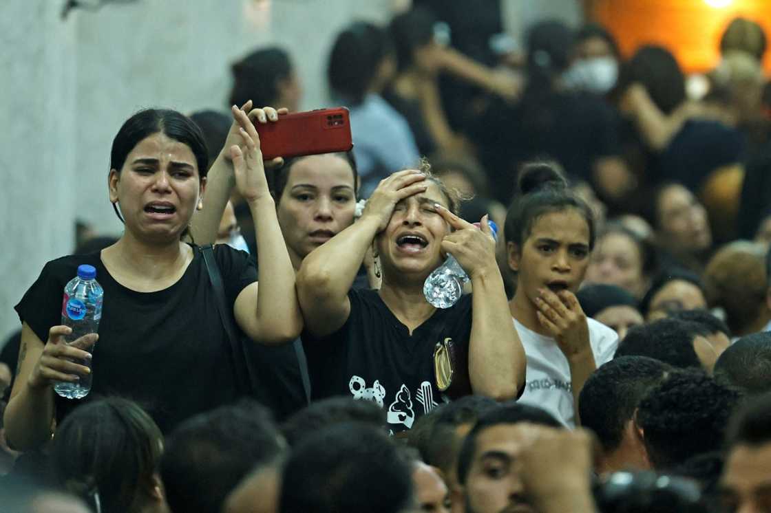 Egyptian mourners at the funeral of victims killed in the Coptic church fire, at the Church of the Blessed Virgin Mary in Imbaba district in the west of greater Cairo Egyptian mourners at the funeral of victims killed in the Coptic church fire, at the Church of the Blessed Virgin Mary in Imbaba district in the west of greater Cairo