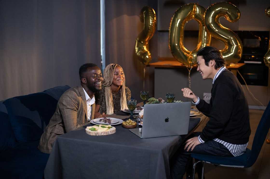 Three colleges having a party. Three colleges having a party.