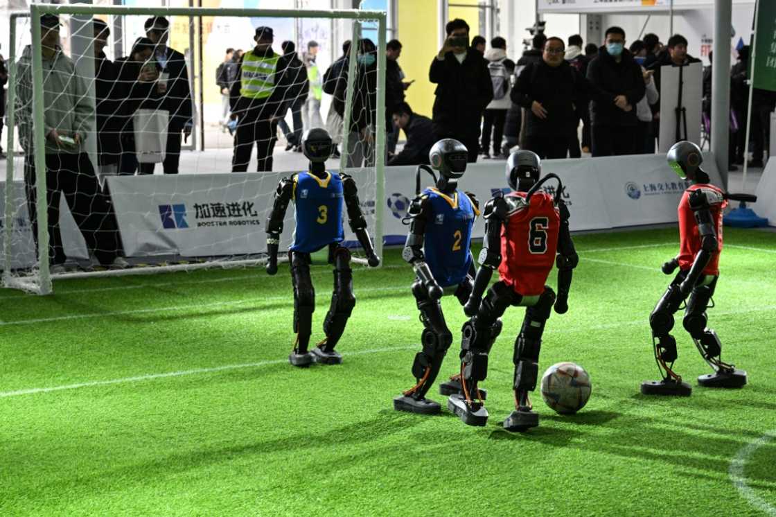 Exhibitors at an AI fair in Shanghai proudly advertised that they were using DeepSeek's open-source software Exhibitors at an AI fair in Shanghai proudly advertised that they were using DeepSeek's open-source software