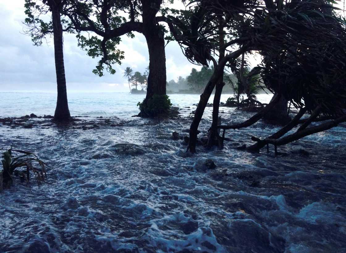 High tide boosted by storm surges wash across Majuro Atoll in the Marshall Islands in the Pacific, threatened by rising sea levels and increasingly intense tropical storms High tide boosted by storm surges wash across Majuro Atoll in the Marshall Islands in the Pacific, threatened by rising sea levels and increasingly intense tropical storms