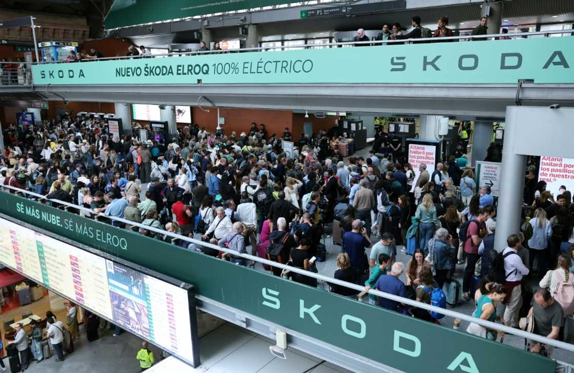Passengers waiting for trains at Atocha station in Madrid on Tuesday Passengers waiting for trains at Atocha station in Madrid on Tuesday