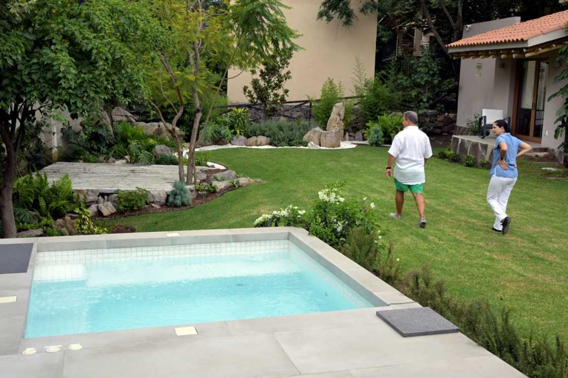 The cohousing project has a large communal garden and a swimming pool