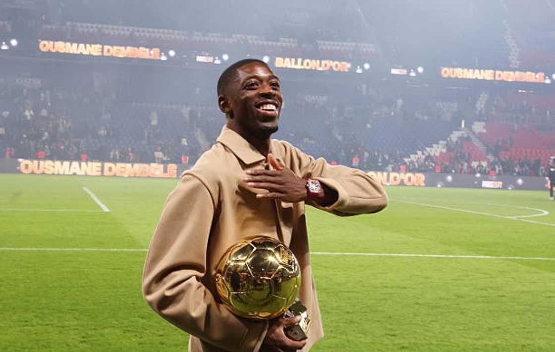 Ousmane Dembele of Paris Saint-Germain celebrates his France Football Ballon d'Or 2025 with fans after the Ligue 1 McDonald's match between Paris Saint-Germain FC and AJ Auxerre at Parc des Princes Ousmane Dembele of Paris Saint-Germain celebrates his France Football Ballon d'Or 2025 with fans after the Ligue 1 McDonald's match between Paris Saint-Germain FC and AJ Auxerre at Parc des Princes