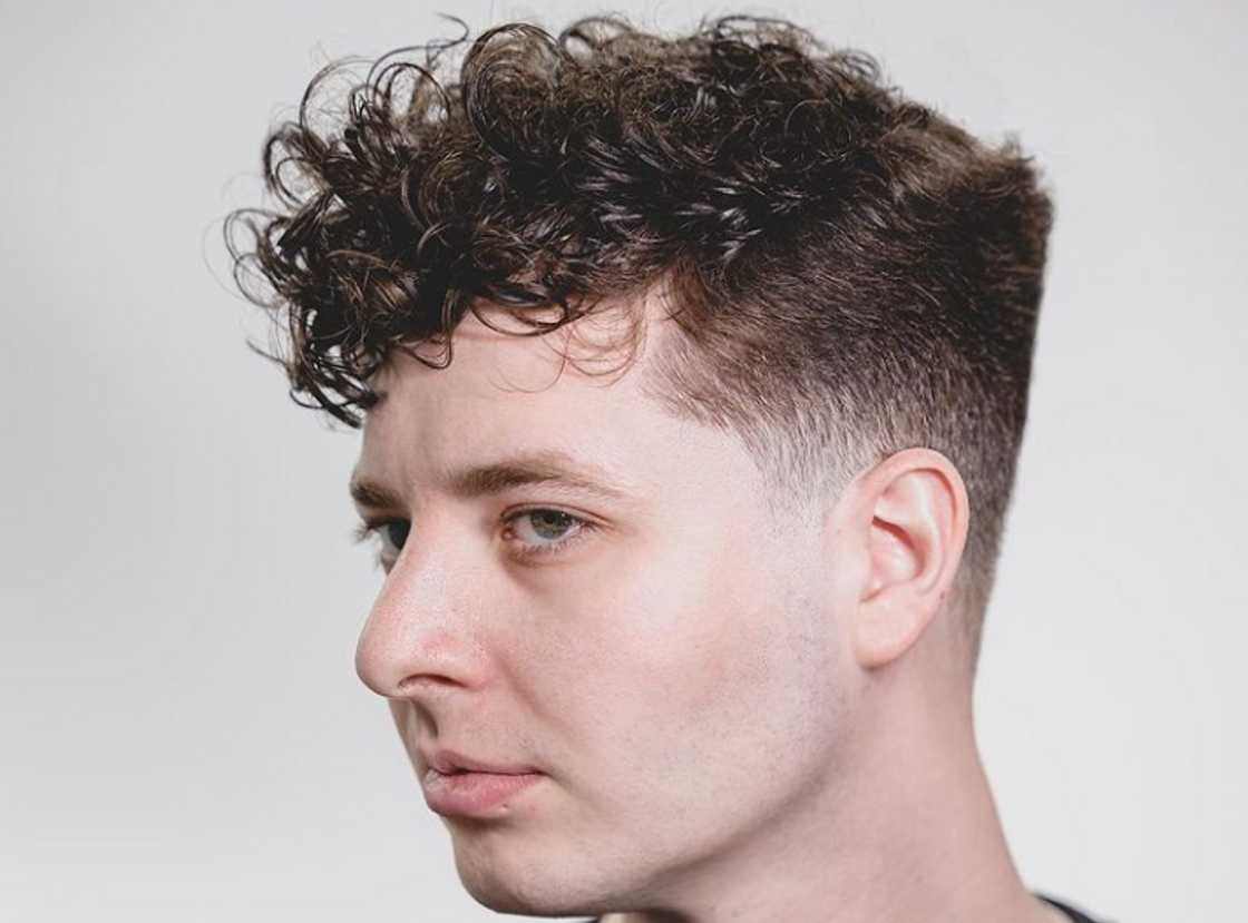 Asymmetrical curly fringe Asymmetrical curly fringe