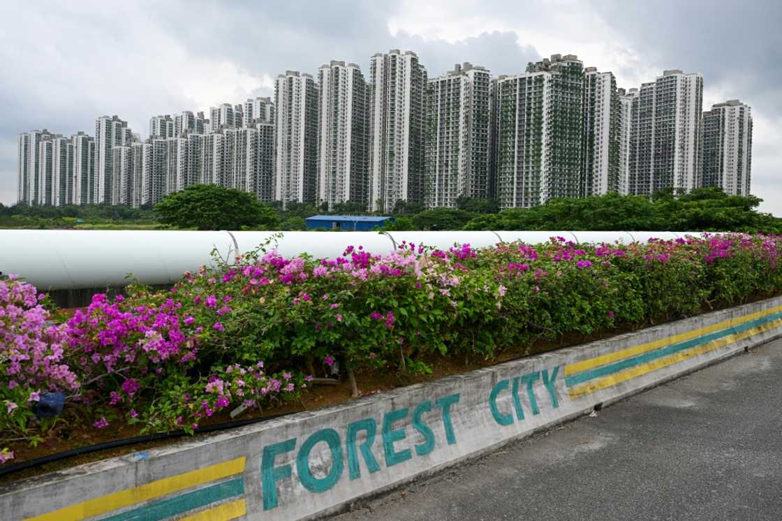 Forest City, a development project by Chinese property giant Country Garden, lies empty as the firm risks defaulting Forest City, a development project by Chinese property giant Country Garden, lies empty as the firm risks defaulting