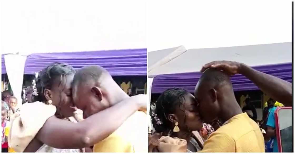 Ghanaian groom shows he is shy as he kisses his new wife Ghanaian groom shows he is shy as he kisses his new wife